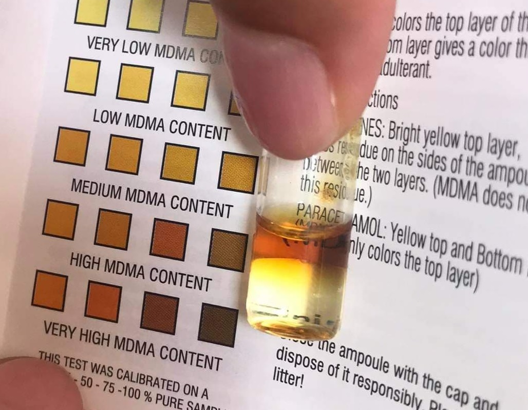 Image of the EZ MDMA Purity test. The reagent has gone pale brown at the top, showing a medium amount of MDMA in the substance tested