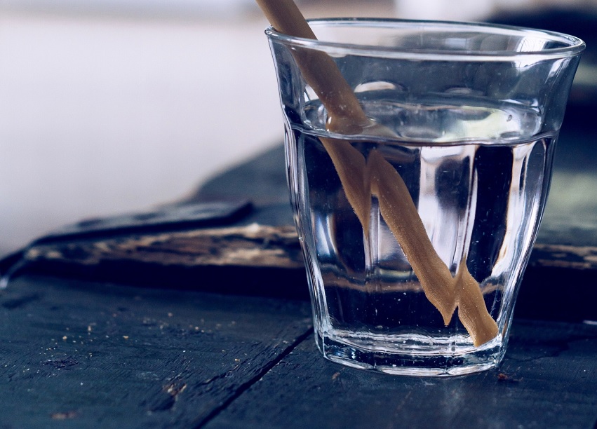 Image, glass of water with a straw in it